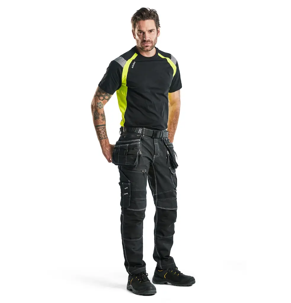 333210309933_T-Shirt_Visible_Zwart_Geel_Presentatie.webp
