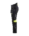 710815129933_Inherent_Multinorm_Dames_Pocketbroek_Zwart_Geel_Linkerzijde.webp